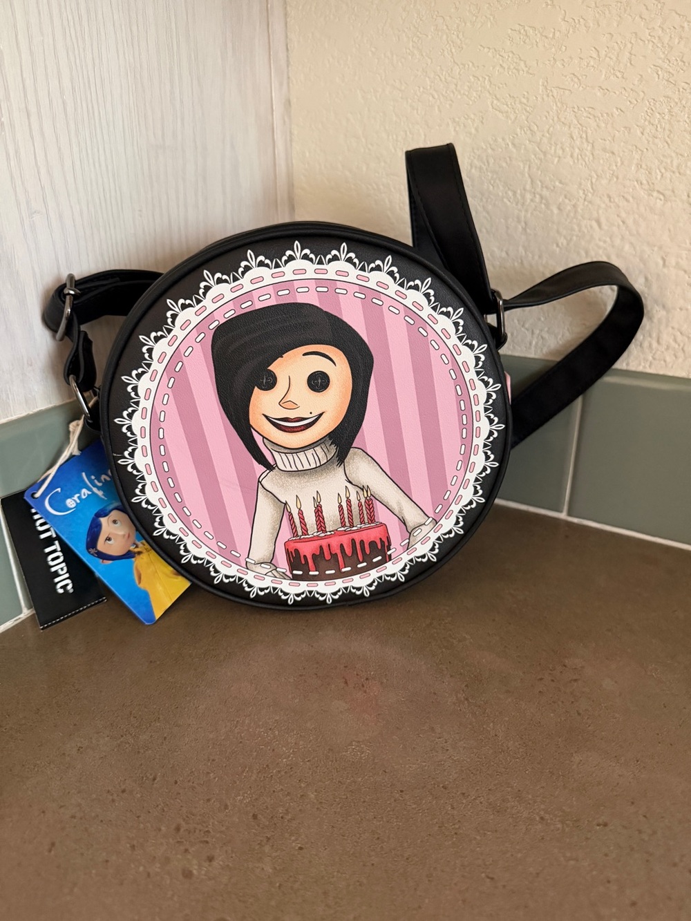 Hot Topic Black Crossbody Bag with Pink Character Panel